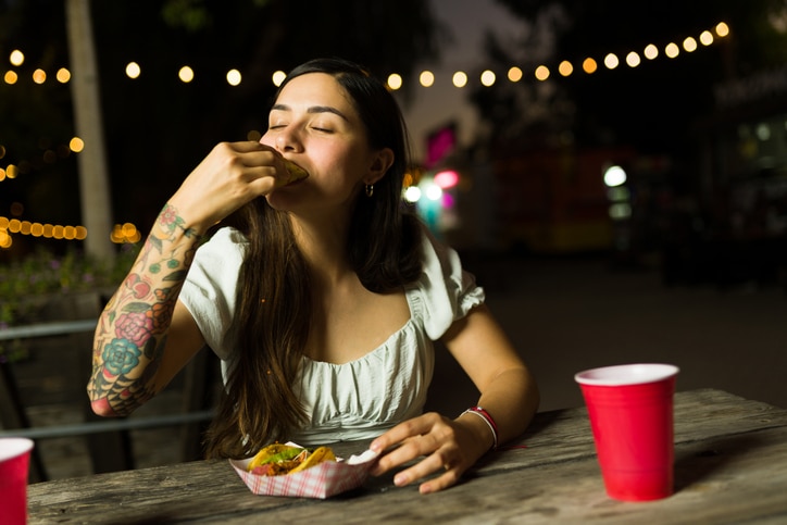 Woman Enjoying Tacos At Esmeraldas The Best Mexican restaurant In Eureka California