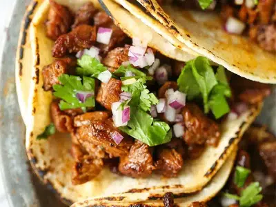 Al pastor street taco with fresh cilantro and onion served at Esmeralda's 2.0 Mexican Restaurant in Eureka California